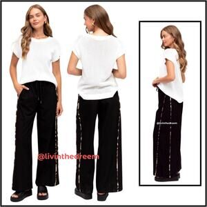 JS MILLENIUM CONTRAST ANIMAL PRINT TRIM PANT $75.00